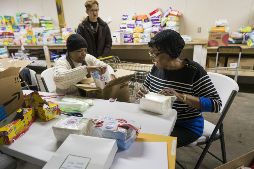 Diaper Bank Volunteers, Willa Mae Hubbard, Arlene L. Harris and Diane Wuycheck help fill orders for diapers. Photo courtesy of The Pittsburgh Foundation